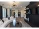 Stylish living area boasts modern lighting, a decorative fireplace, and an open layout at 392 Pratt Dr # 2014, Atlanta, GA 30315