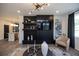Open concept living room boasts built-ins, neutral decor, and lots of light at 392 Pratt Dr # 2014, Atlanta, GA 30315