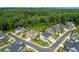 Aerial view of homes in a tree-lined suburban neighborhood at 4503 Atley Woods Se Dr, Atlanta, GA 30339