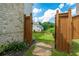 Beautifully landscaped backyard with stone pathway and lush greenery, offering a serene retreat at 4503 Atley Woods Se Dr, Atlanta, GA 30339