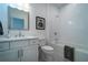Clean bathroom featuring a tub and shower combination and a bright white vanity with modern fixture at 4503 Atley Woods Se Dr, Atlanta, GA 30339