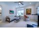 Bright bedroom featuring a sofa, chair, and large window to enjoy views and natural light at 4503 Atley Woods Se Dr, Atlanta, GA 30339