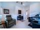 Cozy bedroom featuring a chair, keyboard, desk, and ample natural light creating a relaxing atmosphere at 4503 Atley Woods Se Dr, Atlanta, GA 30339
