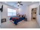 Stylish bedroom features plush carpeting, neutral walls, and a custom walk-in closet providing ample storage at 4503 Atley Woods Se Dr, Atlanta, GA 30339