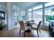 Breakfast nook with large windows and wood floors at 4503 Atley Woods Se Dr, Atlanta, GA 30339