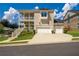 Two-story brick home with charming white porches, spacious driveway, and manicured front lawn at 4503 Atley Woods Se Dr, Atlanta, GA 30339