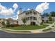 Stylish two-story home with brick exterior, inviting porch, manicured lawn, and professional landscaping at 4503 Atley Woods Se Dr, Atlanta, GA 30339