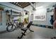 Well-organized garage space featuring epoxy floors, storage cabinets, and equipment racks for tools and sports at 4503 Atley Woods Se Dr, Atlanta, GA 30339