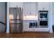Modern kitchen appliances: stainless steel refrigerator, microwave and double ovens at 4503 Atley Woods Se Dr, Atlanta, GA 30339