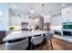 Spacious kitchen with island, quartz countertop, modern appliances and white cabinetry at 4503 Atley Woods Se Dr, Atlanta, GA 30339