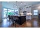 Bright kitchen with large island, pendant lighting, white cabinetry and stainless steel appliances at 4503 Atley Woods Se Dr, Atlanta, GA 30339
