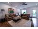 Inviting living area with dual leather sofas, a plush rug, and abundant natural light at 4503 Atley Woods Se Dr, Atlanta, GA 30339