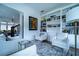 Cozy living room with custom bookshelves, and serene ambiance, ideal for reading and relaxation at 4503 Atley Woods Se Dr, Atlanta, GA 30339