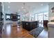 Open concept living area with kitchen island, recessed lighting, and hardwood floors at 4503 Atley Woods Se Dr, Atlanta, GA 30339