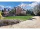 Traditional brick house with manicured lawn at 821 Camden Park Ct, Atlanta, GA 30342