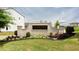 Elegant community sign for Village Towns-Lafayette, set against a backdrop of lush landscaping at 135 Climbing Ivy Cir, Fayetteville, GA 30214