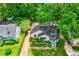 Aerial view of a cozy home with lush trees and well-maintained yard at 135 Martha Ne Ave, Atlanta, GA 30317