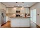 Updated kitchen featuring granite counters, stainless steel appliances, and modern lighting fixtures at 135 Martha Ne Ave, Atlanta, GA 30317
