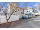 Backyard with fenced yard and driveway, offering parking space and separation from the house at 320 Harden St, Atlanta, GA 30312