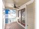 Outdoor balcony area with wood flooring and covered ceiling at 320 Harden St, Atlanta, GA 30312