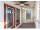 Balcony with railing, ceiling fan, and glass paneled doors at 320 Harden St, Atlanta, GA 30312
