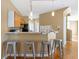 Open kitchen featuring bar seating, track lighting, and seamlessly connects to the main living area at 320 Harden St, Atlanta, GA 30312