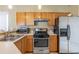 Functional kitchen equipped with modern appliances and ample cabinet space for storage at 320 Harden St, Atlanta, GA 30312