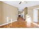 The home's open-concept living room features hardwood floors, and a fireplace at 320 Harden St, Atlanta, GA 30312
