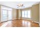 The home's large living room features hardwood floors and French doors leading to a private balcony at 320 Harden St, Atlanta, GA 30312