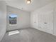 Empty bedroom with carpet, window, and double closet at 36 Crescent, Dallas, GA 30157
