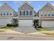 Charming townhome featuring a two-car garage, gray siding, and well-maintained landscaping at 36 Crescent, Dallas, GA 30157