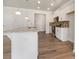 Well-lit kitchen with granite countertops, pendant lighting, and stainless steel appliances at 36 Crescent, Dallas, GA 30157