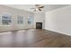 Bright living room with fireplace, hardwood floors, and ample natural light at 36 Crescent, Dallas, GA 30157