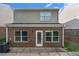 The backyard of this home features a brick facade and windows at 368 Rankin Cir, Mcdonough, GA 30253