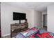 Themed bedroom showcasing carpeted floors, modern dresser, and tv at 368 Rankin Cir, Mcdonough, GA 30253