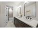 Stylish bathroom featuring dual vanities and a separate shower and toilet room at 3710 Country Estate Dr Nw, Kennesaw, GA 30152