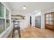 Bright kitchen featuring stainless steel appliances, light cabinets and hardwood flooring at 3710 Country Estate Dr Nw, Kennesaw, GA 30152