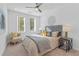 Stylish bedroom with natural lighting, ceiling fan, and comfortable decor at 388 Pratt Dr # 2113, Atlanta, GA 30315