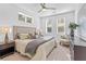 Bright bedroom with a comfortable bed, soft lighting, and views of the outside at 388 Pratt Dr # 2113, Atlanta, GA 30315