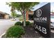 Community signage at the entrance of the Beacon with lush green landscaping at 388 Pratt Dr # 2113, Atlanta, GA 30315