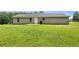 Expansive backyard with lush green grass, offering space for recreation and outdoor activities at 256 Prometheous Way, Rockmart, GA 30153