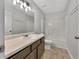 Bathroom featuring a vanity, mirror, and a shower-tub combination at 256 Prometheous Way, Rockmart, GA 30153