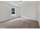 Cozy bedroom featuring neutral carpet and a window that provides natural light at 256 Prometheous Way, Rockmart, GA 30153