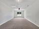 Spacious bedroom with neutral carpet, a ceiling fan, and a window for natural light at 256 Prometheous Way, Rockmart, GA 30153
