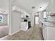 Efficient kitchen with white cabinets, black appliances, and ample counter space at 256 Prometheous Way, Rockmart, GA 30153