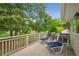 Private balcony overlooking mature trees and lush landscaping provides a serene escape at 2610 Links End, Roswell, GA 30076