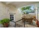 Charming covered deck with outdoor seating provides a relaxing outdoor space at 2610 Links End, Roswell, GA 30076