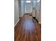 Welcoming entryway features wood floors and ample natural light at 3064 Baymount Way, Lawrenceville, GA 30043