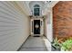 Inviting entrance features a stylish front door with decorative wreath at 3064 Baymount Way, Lawrenceville, GA 30043