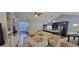 Open concept living room showcasing hardwood floors, natural light, and comfortable seating at 3064 Baymount Way, Lawrenceville, GA 30043